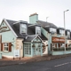 Exterior view of The Loans Inn on a dull day