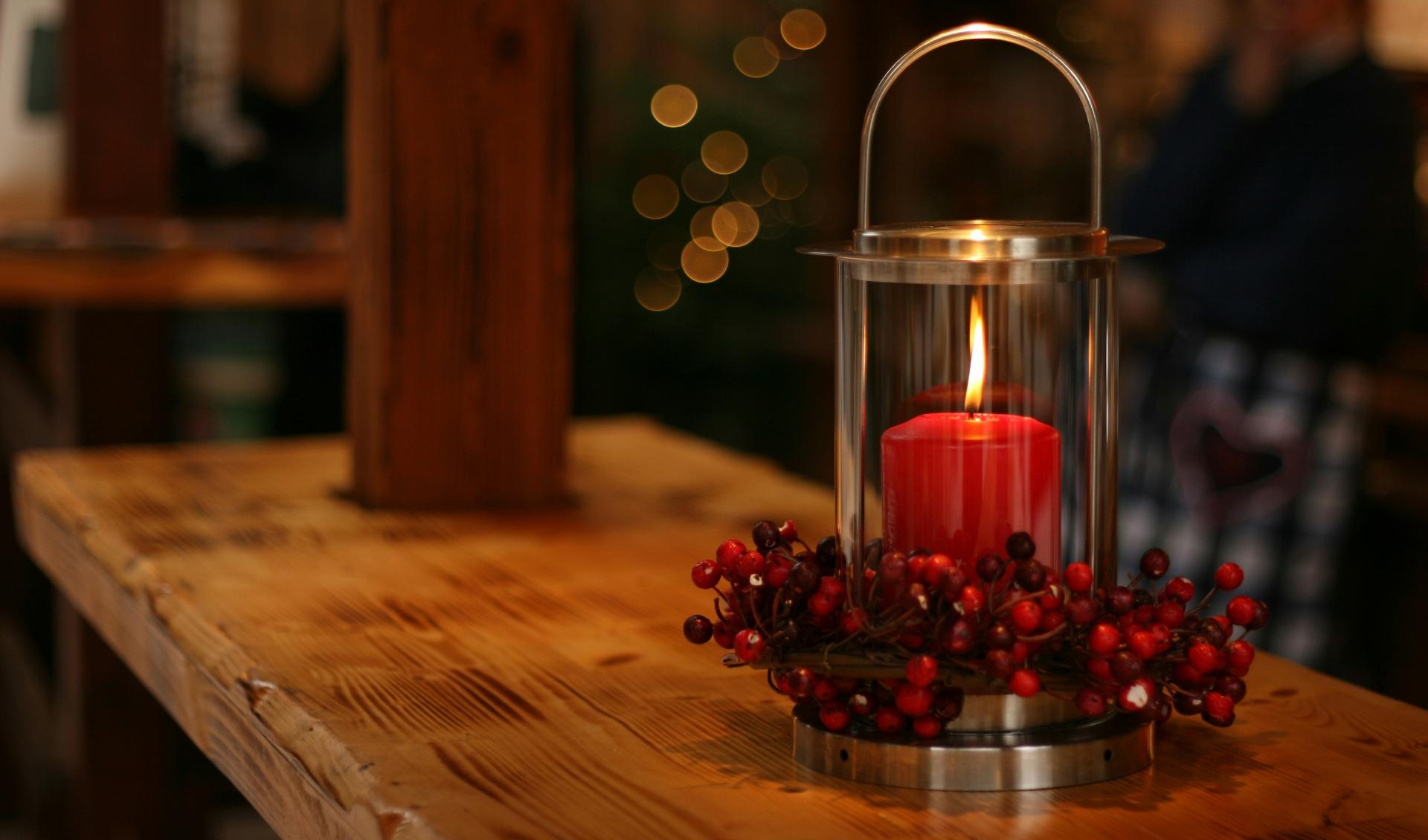 Decorative image of Christmas featuring a candle